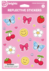 Brightz Reflective Stickers sheet featuring colorful cartoon stickers including blue butterflies, pink bows, red cherries, white flowers, yellow smiley faces, strawberries, peace signs, and stars on a pink background.
